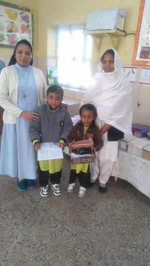 Children receiving shoes at school.